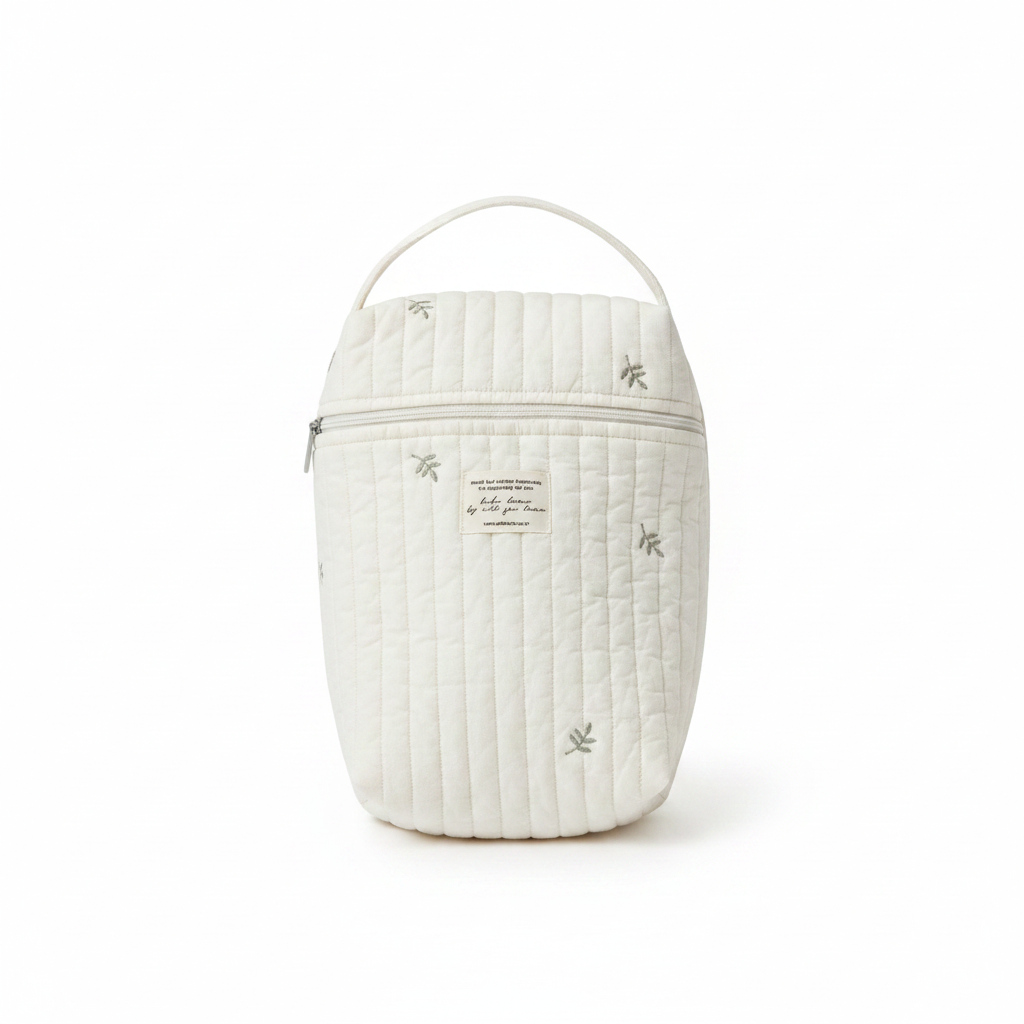 Pochette matelassée feuilles fond blanc